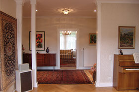 Großes Wohnzimmer durch Öffnen einer Wand